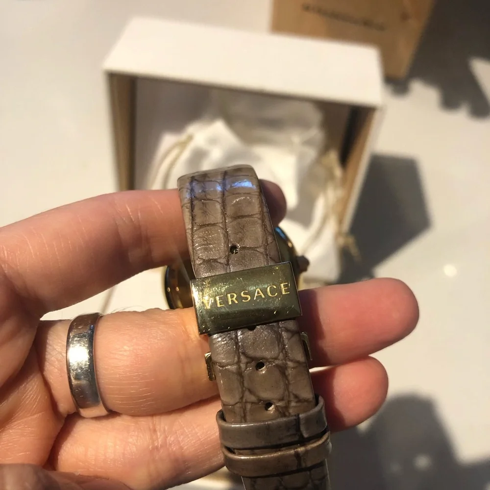 Versace White Dial Watch with Gold Bezel and Brown Strap